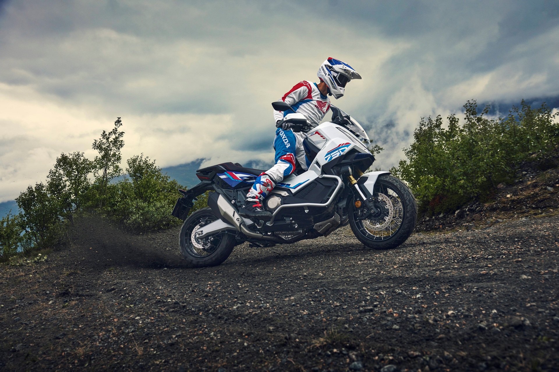 Honda X-ADV750 Special Edition on a gravel track - the off-road capable automatic scooter from Honda