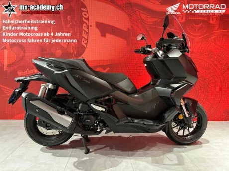 Honda ADV350 adventure scooter in black with the high screen from the Honda genuine accessory range